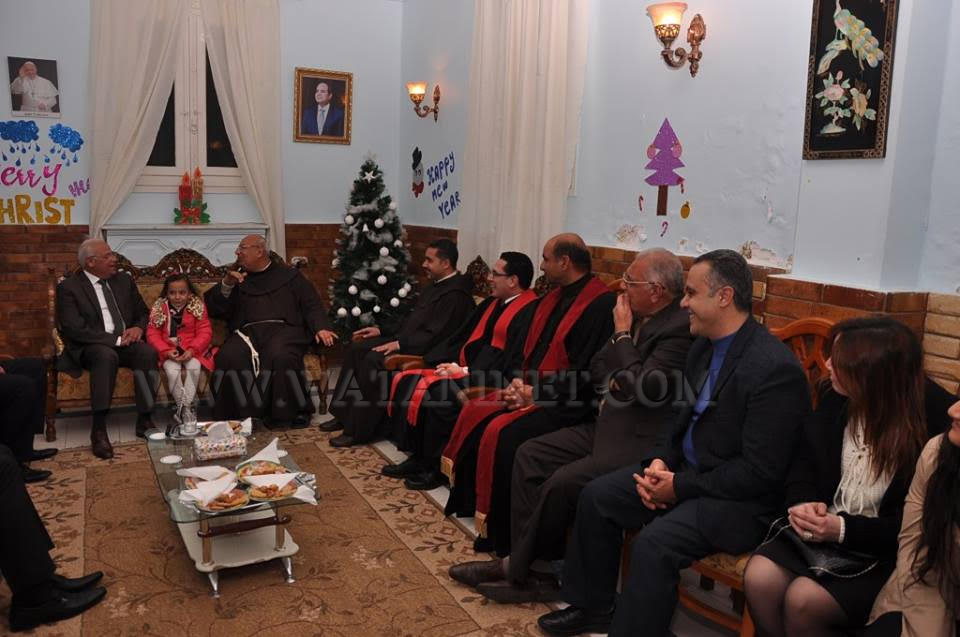  محافظ بورسعيد يزور كنيستى سانت اوجيني والقديس نيقوكلاس